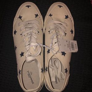 White sneakers with stars
